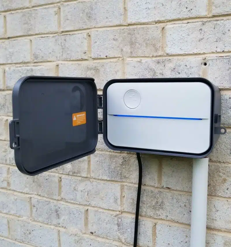 rachio outdoor enclosure open door with conduit